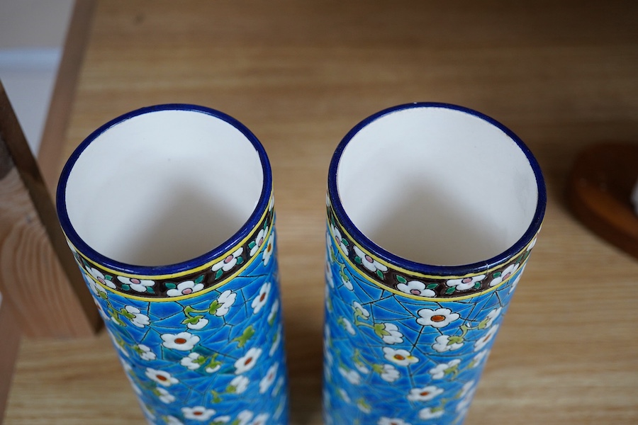 A pair of Longwy pottery cylindrical vases, 23cm high. Condition - one good, minor chip to base, other is cracked